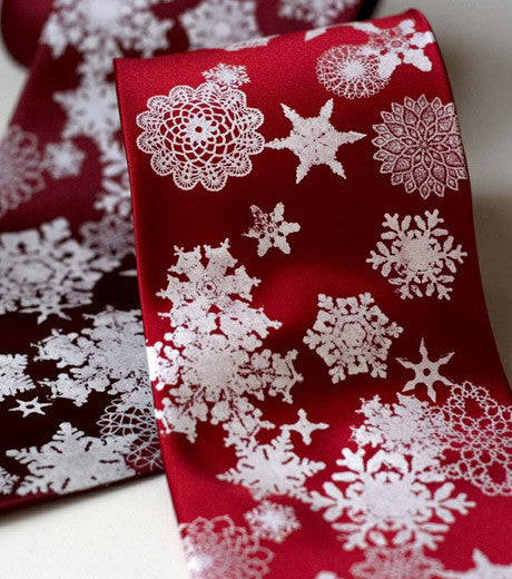 White ink on burgundy, crimson.
