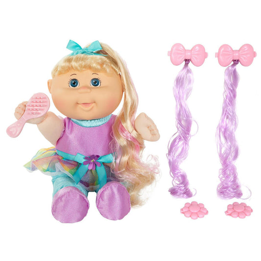 An 11-inch doll with blonde hair, blue eyes, wearing a purple outfit, accompanied by a brush and additional hair accessories.