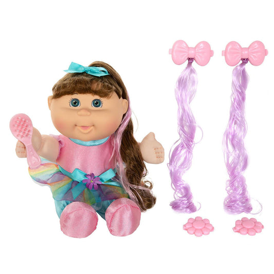 An 11-inch doll with brown hair, blue eyes, wearing a pink outfit, accompanied by a brush and additional hair accessories.