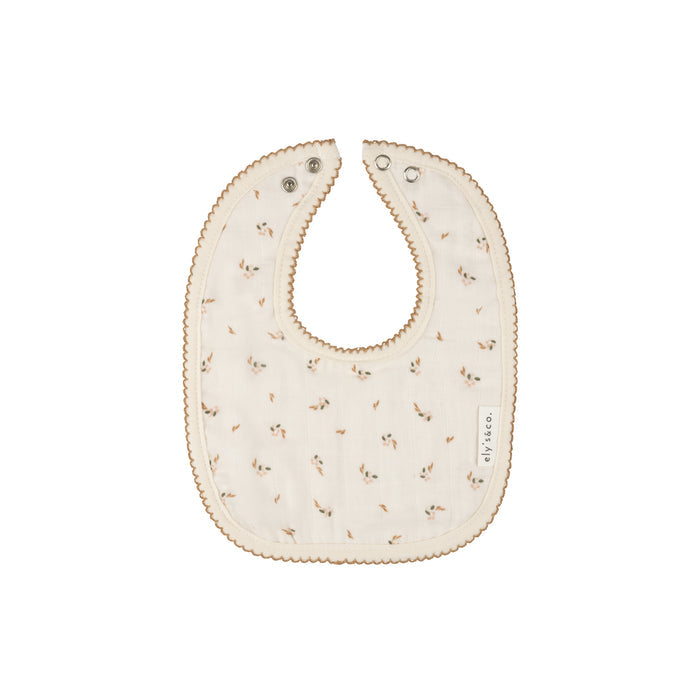 White floral terry muslin bib