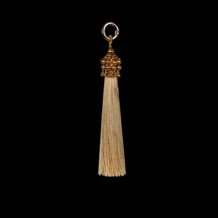 beaded modular metal beads with polyester tassels in gold by object and dawn