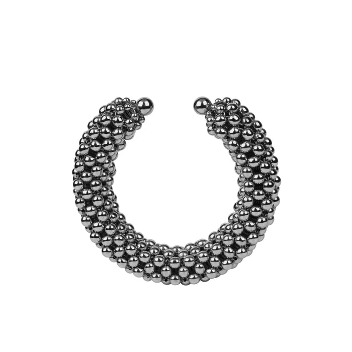 Object & Dawn beaded wrist accessory in ivory, structured supple cuff with polymer metal beads, ghost image front view