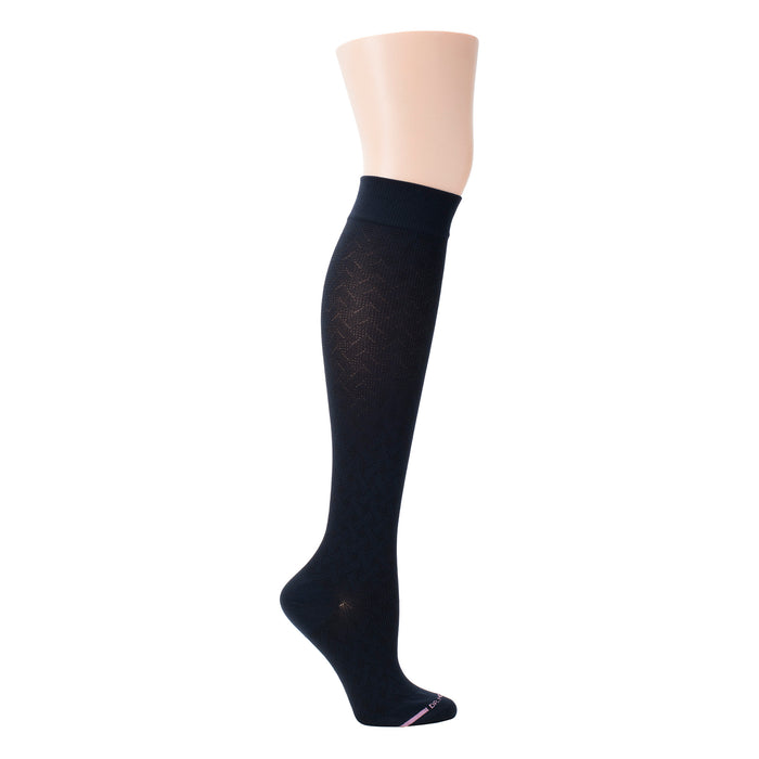 Knee-high compression socks in a dark color with a basket weave pattern and a solid cuff at the top.