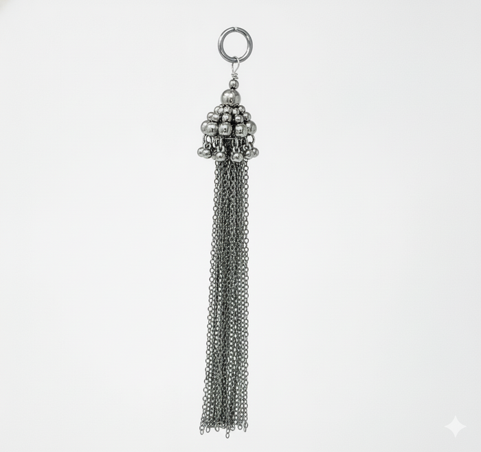 Beaded chain tassels beads in silver color  on a grey background by Object&Dawn