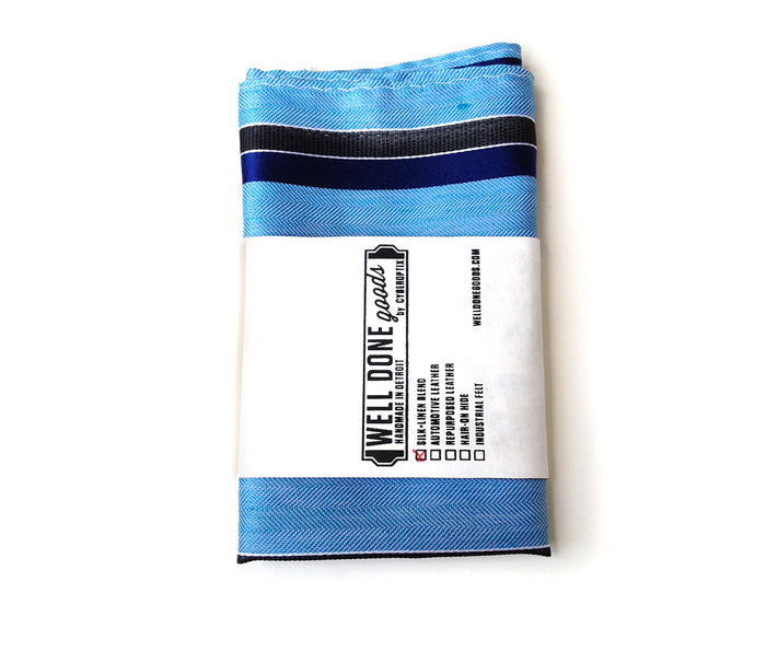 Blue diagonal striped linen + silk blend woven pocket square.