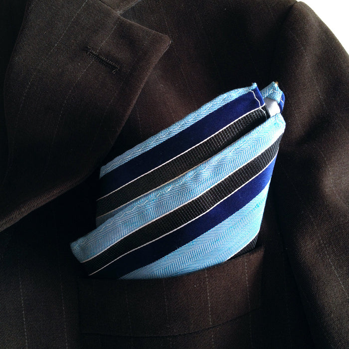 Blue diagonal striped linen + silk blend woven pocket square.