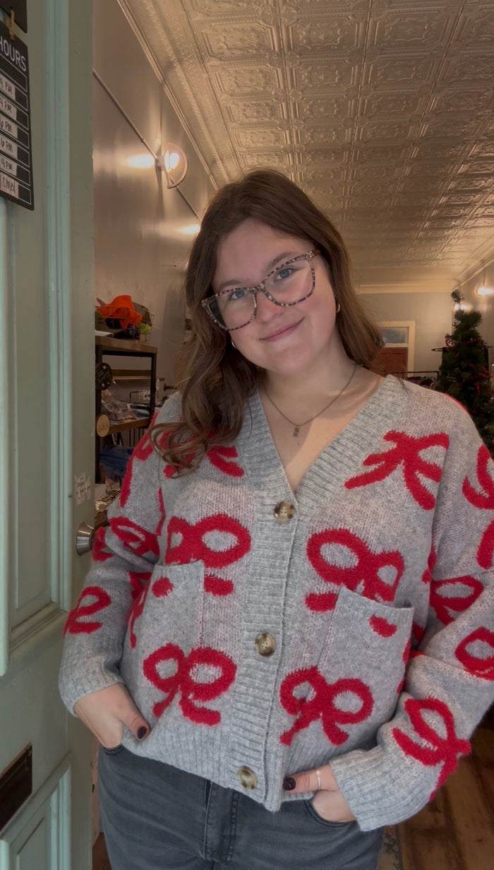 BOW PATTERN BUTTON DOWN KNIT CARDIGAN