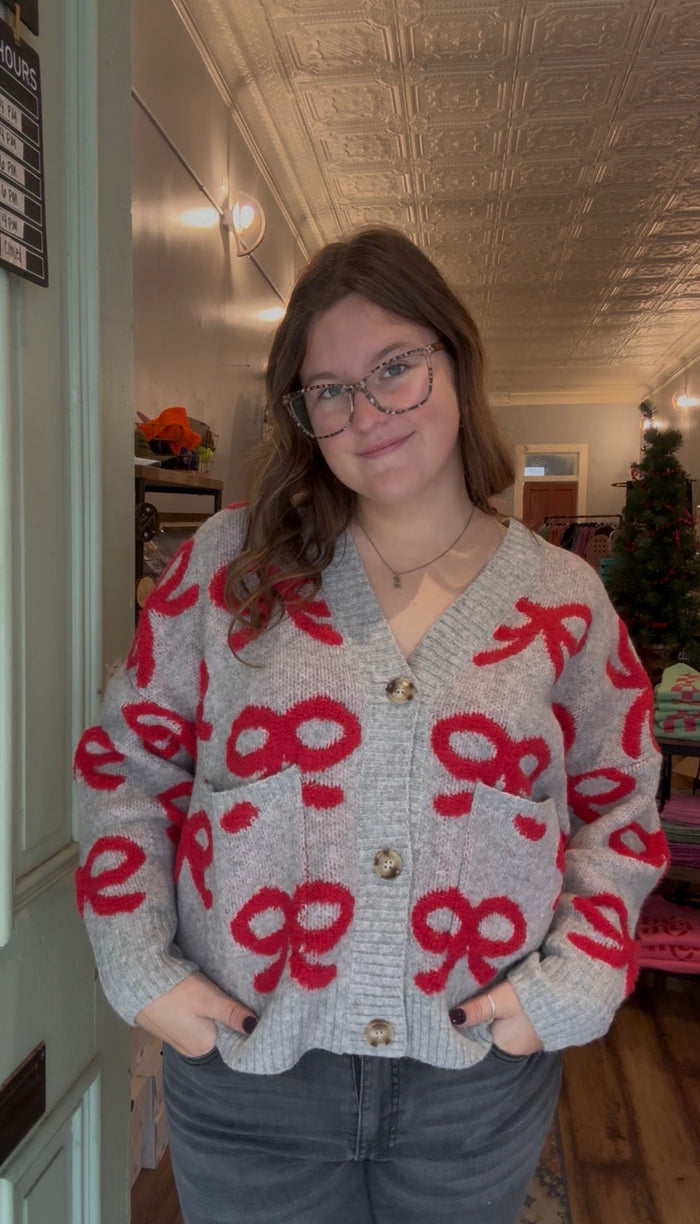 BOW PATTERN BUTTON DOWN KNIT CARDIGAN