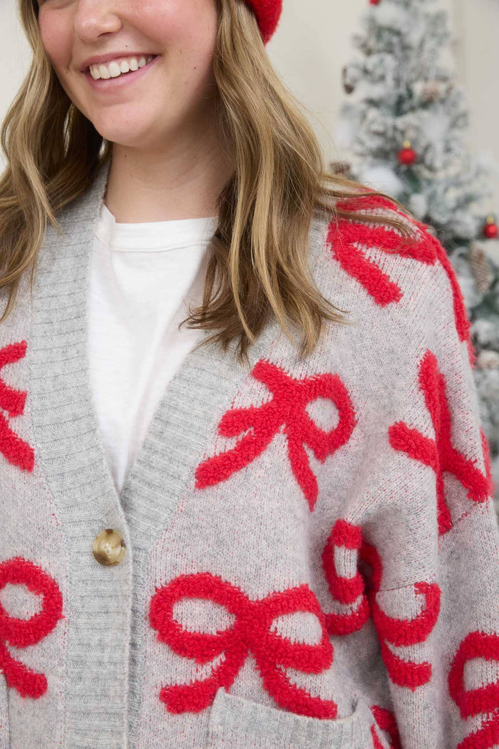 BOW PATTERN BUTTON DOWN KNIT CARDIGAN