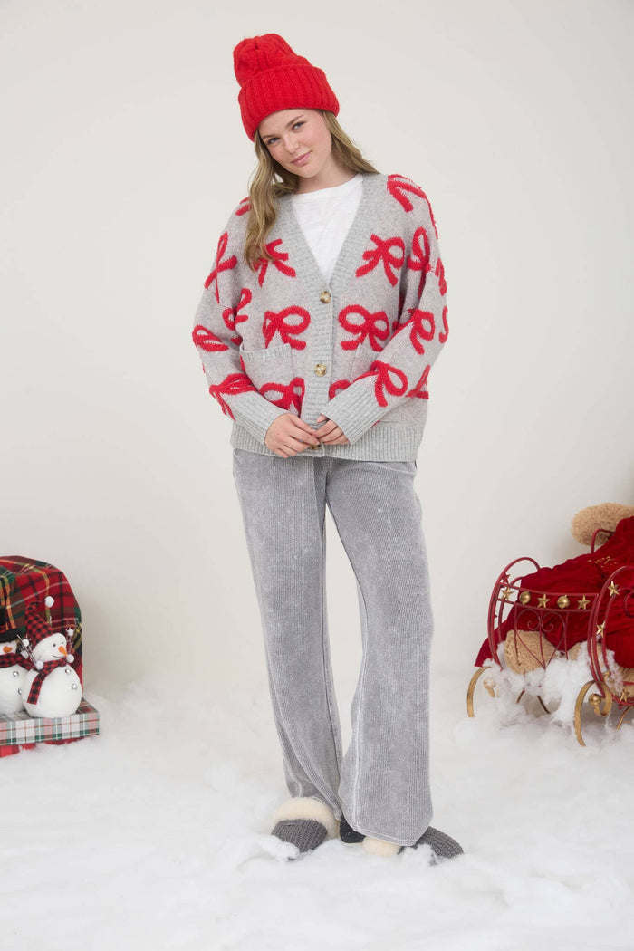 BOW PATTERN BUTTON DOWN KNIT CARDIGAN