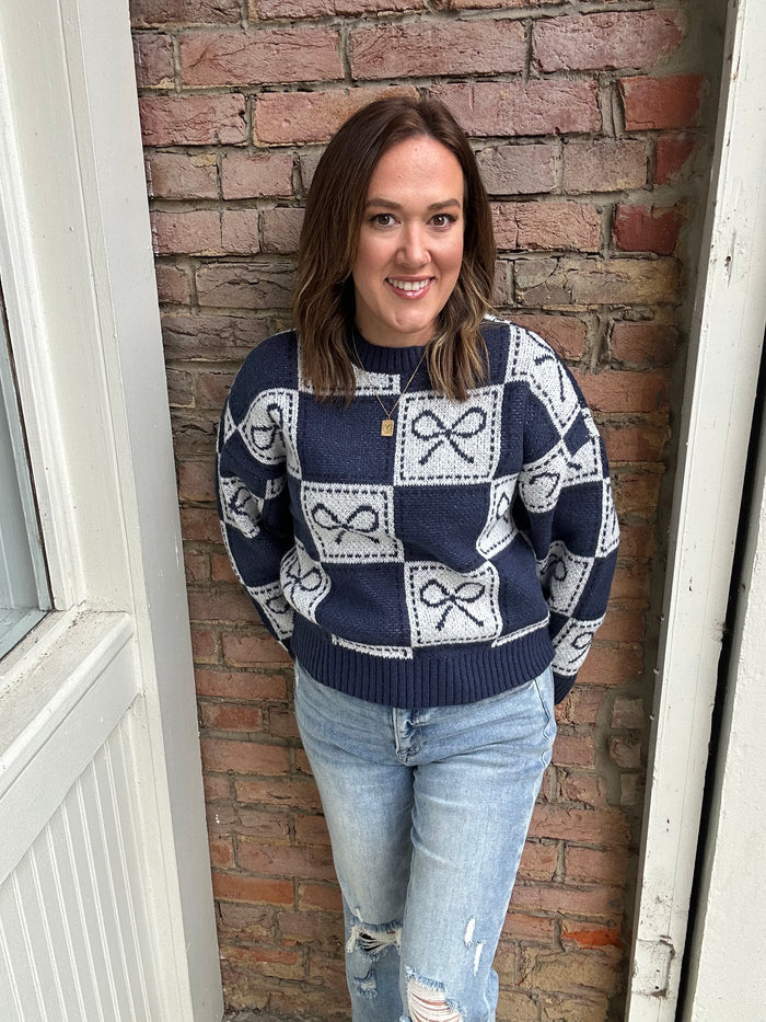 Checkerboard Bow Holiday Sweater