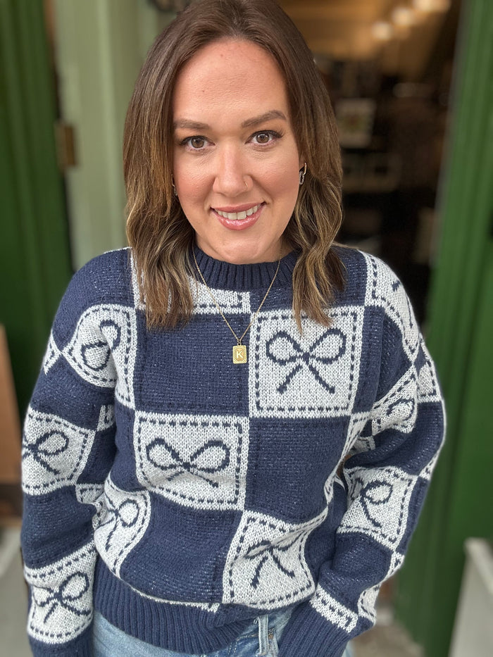 Checkerboard Bow Holiday Sweater