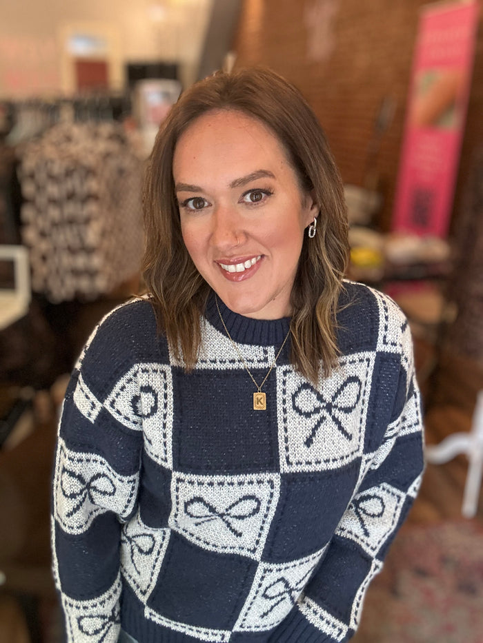 Checkerboard Bow Holiday Sweater
