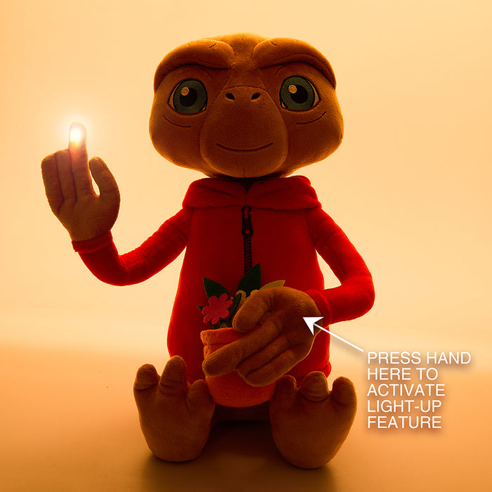 E.T. the Extra-Terrestrial 13-inch interactive plush with light-up finger, soft plush toy featuring E.T. character and hood.