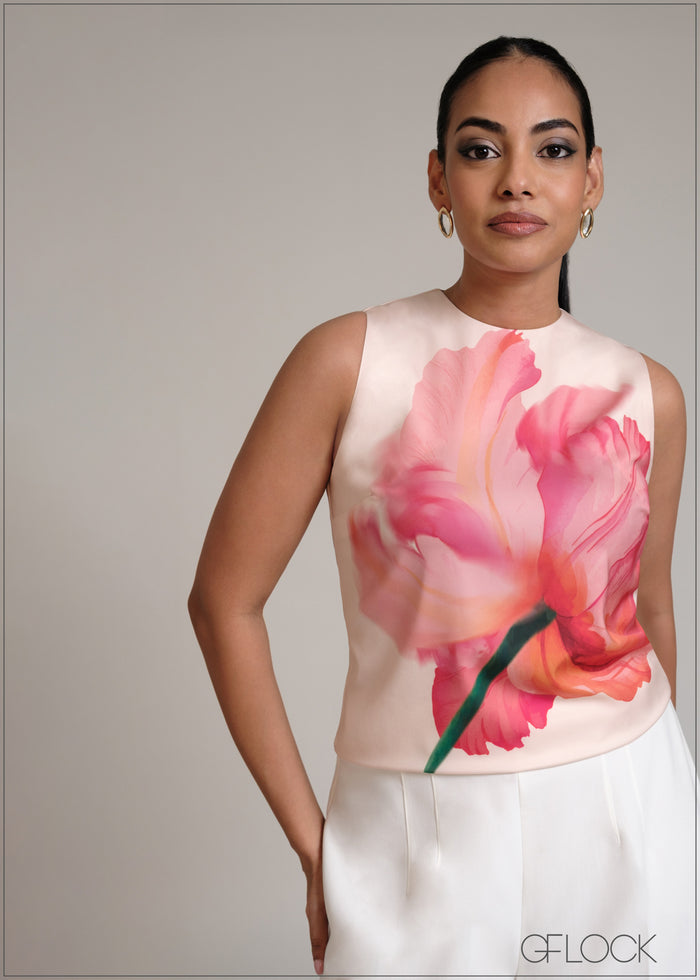 Sleeveless satin top with large pink floral print at front
