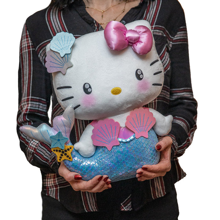 Sanrio Hello Kitty® mermaid plush by Kidrobot, featuring soft fabric, colorful mermaid tail, and cute Hello Kitty face.