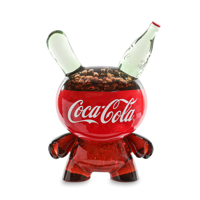 Limited edition 8-inch Coca-Cola resin Dunny art figure by Kidrobot, featuring a colorful Coca-Cola-themed design.