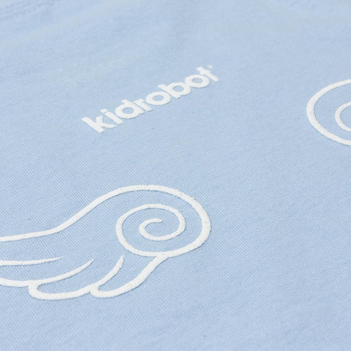 Sanrio Kidrobot x Hello Kitty Bittersweet T-shirt featuring colorful Hello Kitty artwork by Candie Bolton, casual apparel for kids and adults.