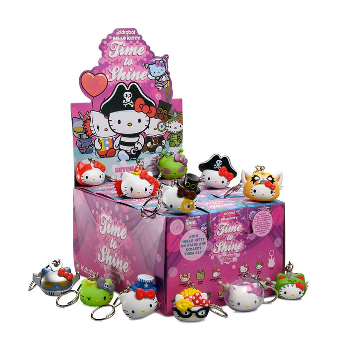 Sanrio Kidrobot Hello Kitty Time to Shine keychain featuring a colorful Hello Kitty character on a bright background.