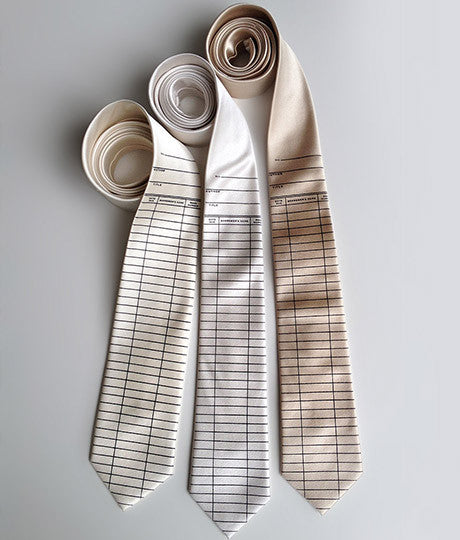Library tie: black on cream, platinum, champagne.