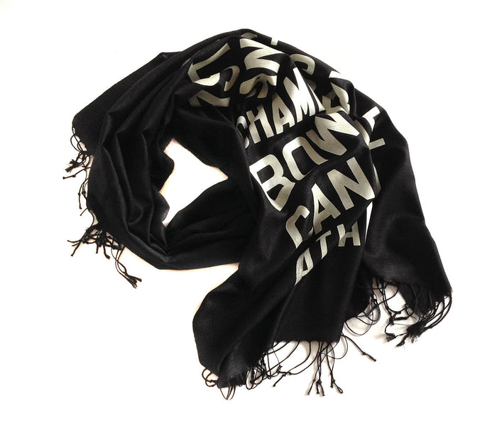 Ivory-cream ink on black light pashmina.