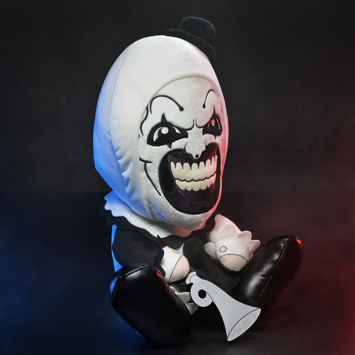 Large plush of Art the Clown from Terrifier 3, soft toy featuring detailed clown costume and menacing facial expression.