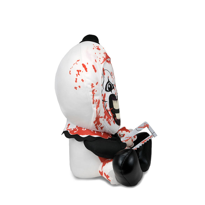Large plush of Art the Clown from Terrifier 3 with bloody details, featuring a soft plush texture and detailed clown costume.