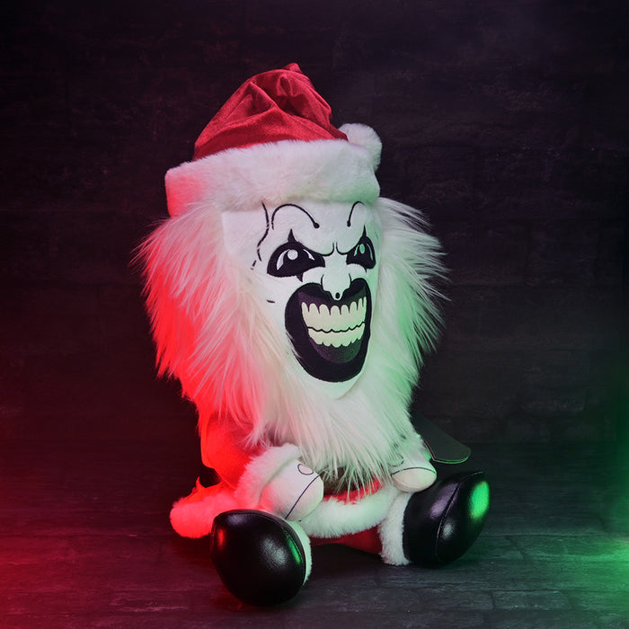 Large plush Santa suit featuring Art the Clown from Terrifier 3, soft and detailed, perfect for collectors and fans.