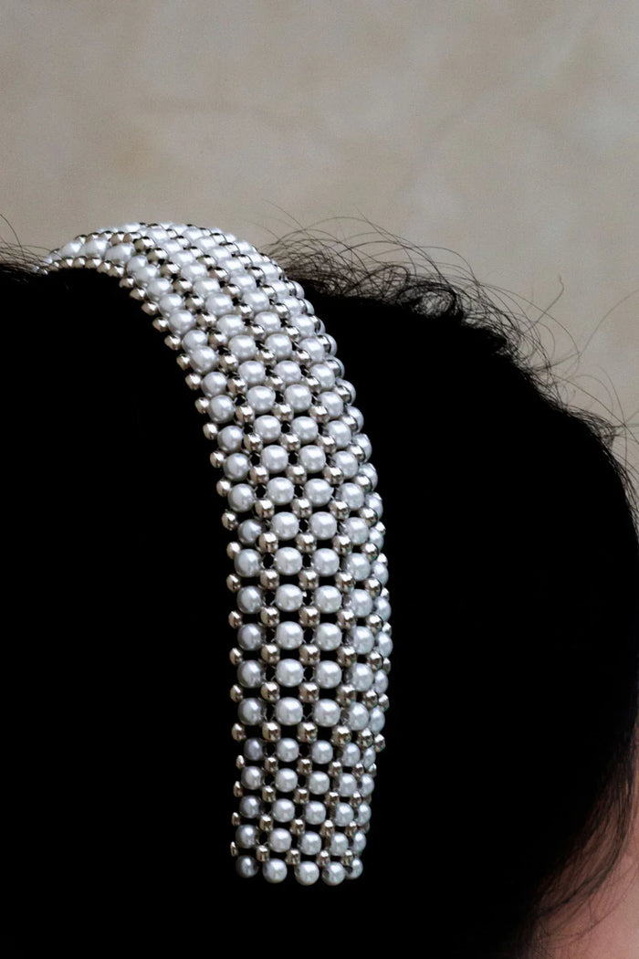 Object & Dawn Teuta Headband pearl detail view worn by woman in neutral background