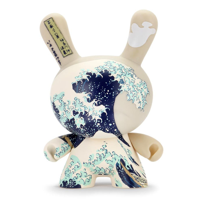 The Met 8-Inch Masterpiece Dunny featuring Hokusai's Great Wave with detailed blue wave design and traditional Japanese art style