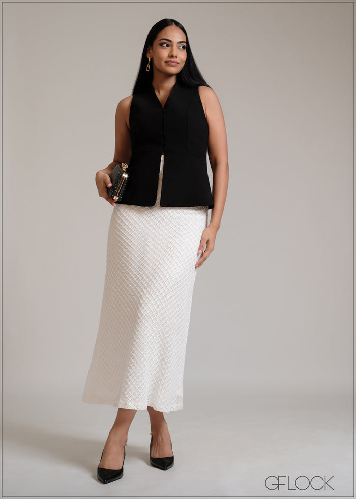 Black sleeveless  peplum detailed V neck top with front buttons and  slit