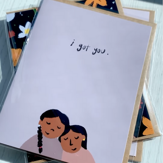 Card with illustration of two people and 'I got you.' text on a light purple background