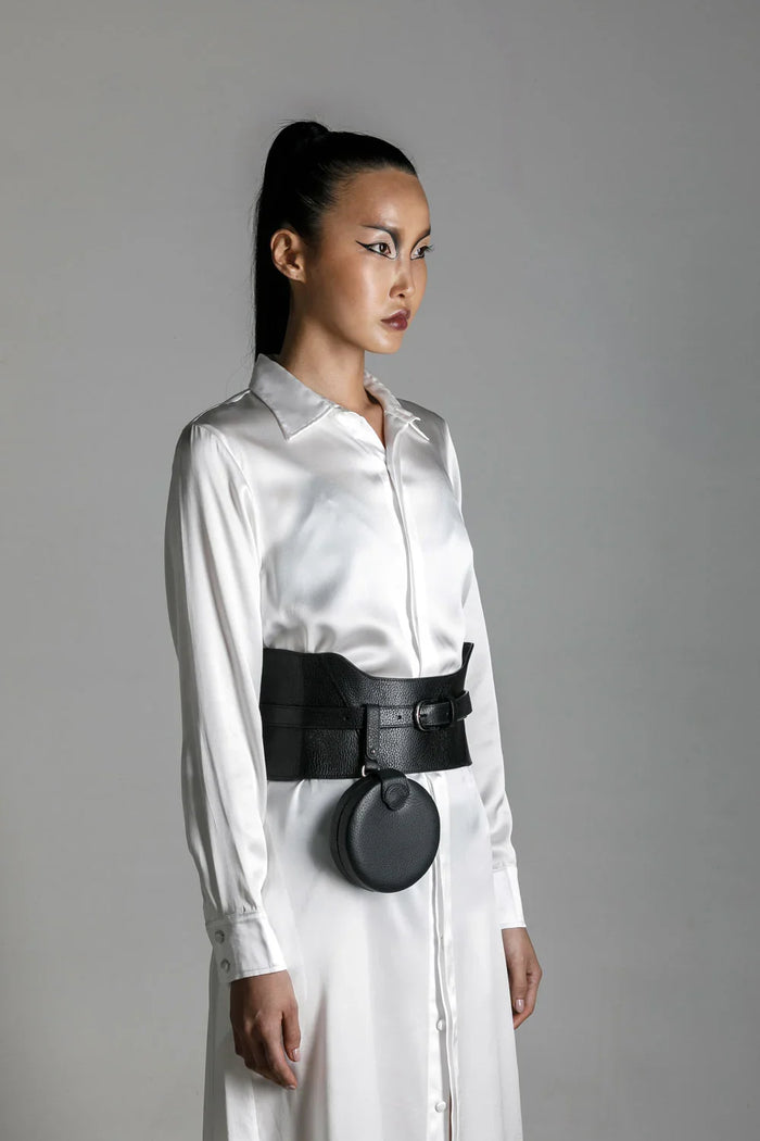 woman wear anais hilk shirt dress with zheng coin bag and corset belt by object and dawn