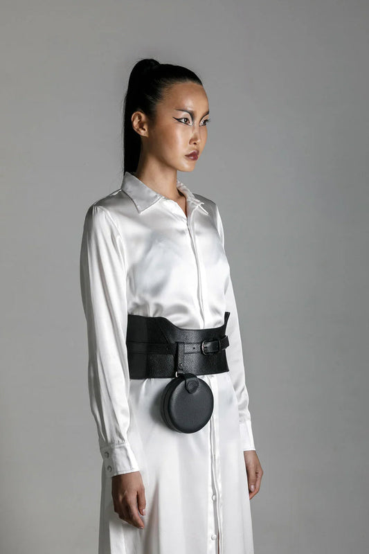 woman wear anais hilk shirt dress with zheng coin bag and corset belt by object and dawn