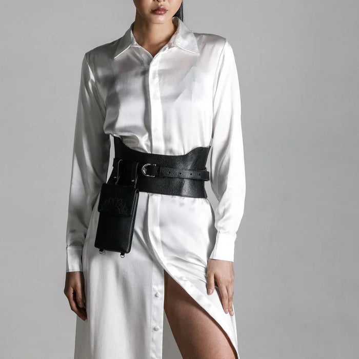 woman in white shirt dress wear zheng iphone bag and corset belt by object and dawn close up in netural background